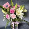 OUR PINK ROSES, LILIES, CARNATION ARRANGEMENTS SPEAK VOLUMES! BEAUTIFULLY HAND MADE IN