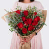 A gorgeous wrapped bouquet designed with premium 1 Dozen Red Roses, Wax