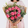 A gorgeous wrapped bouquet designed with premium 1 Dozen Pink Roses, Wax
