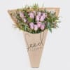 A gorgeous wrapped bouquet designed with premium 1 Dozen Lavender Roses, Wax