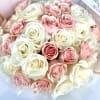 Such an elegant bouquet of pink and white roses, exuding timeless elegance