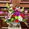 Recipe: Stargazers, Blood red/orange roses, peonies, rauculus, orchids, bells of ireland, chrystanthemums