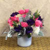 Turn heads with this striking, modern arrangement! Deep, velvety purples meet vibrant