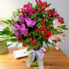 A kaleidoscope of intense color can best describe this vivid arrangement boasting
