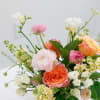 Sunshine Surprise is a vibrant bouquet bursting with cheerful, yellow blooms. Perfect