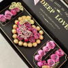 Pink roses with Ferrero Rocher in a large box