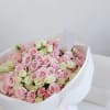 A soft and elegant mix of blush pink and ivory baby roses.