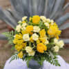 This monochromatic arrangement is to brighten anyones day,  or room.Vase may