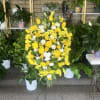 fresh white and yellow floral mix , arrangement comes with banner add