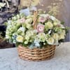 Brighten any space with our Elegant Flower basket Arrangement! Bursting with vibrant