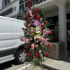 A standings flower arrangement for a funeral service is a heartfelt tribute