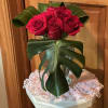 Start with a Regal Crystal keepsake Vase, add in 6 roses and