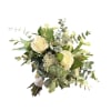 A lush handtied bouquet in all white flowers and a variety of