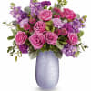 Capture Mom&#039;s heart with Teleflora&#039;s Vivi vase, crafted from hand-blown art glass