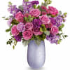 Capture Mom&#039;s heart with Teleflora&#039;s Vivi vase, crafted from hand-blown art glass