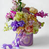 Send this beautiful large sized deluxe lavender hat box flower arrangement filled
