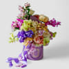 Send this beautiful large sized deluxe lavender hat box flower arrangement filled