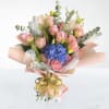 This bouquet is made of soft pink roses and one bright blue