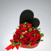 This beautiful red surprise shown above holds 1 dozen red roses. 