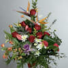 Beautiful Birds of paradise with mixed flowers combined to bring an exotic