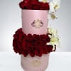 This grand arrangement is full of beautiful roses with added lilies and