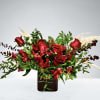 This stunning red arrangement comes with red roses and red alstroemerias a