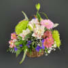 A delightful basket filled with fragrant flowers including Rose Lilies, Alstroemeria, Gerbera