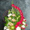This creative red rose arrangement is perfect for any occasion!
Disclaimer: Flowers may