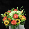 This arrangement use summer color flowers to make , roses, sunflowers and