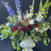 This is a large sympathy arrangement in reds, whites and blues
