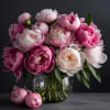 Gorgeous peonies in a glass vase. Peonies are the most luxurious flower.
