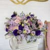 Fresh array of lavender and light pink flowers nestled in a large