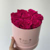 Pink preserved forever roses nestled in a light pink Bo&icirc;te box. 