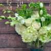 An XL mix of jumbo hydrangea, roses,  tulips, orchids, and our