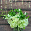 An XL mix of jumbo hydrangea, roses,  tulips, orchids, and our