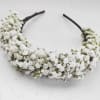 A delicate and romantic hair crown made with fresh baby&rsquo;s breath flowers