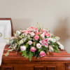 A soft blanket of delicate pinks and whites to lay upon your