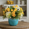 Brighten Any Space with Our Aqua Blue Spring Bloom Arrangement

Make a statement