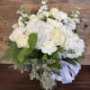Beautiful all white bouquet that will send kind wishes.