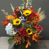 Fall favorites an assortment of fall flowers with oak leaves