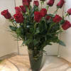 Premium Long Stem Red Roses with Fancy Greens in a Tall Vase.

Call