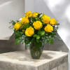 Cheer someone up with this bright bold design with yellow roses, alstroemeria