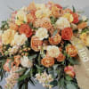 Honor a beautiful life with a graceful display of fresh flowers designed