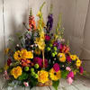 This beautiful statement piece is filled with lush flowers in a long