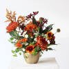 Celebrate the beauty of fall with our &quot;Mum&#039;s the Word&quot; floral arrangement.