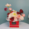 Celebrate the beauty of spring with our premium floral arrangement, featuring a