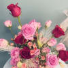 Celebrate the beauty of spring with our premium floral arrangement, featuring a