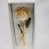 A real rose preserved to last and then trimmed with real 24kt