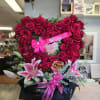 For any occasion a beautiful open heart designed with lush roses in