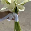 A classic delicate and always fashionable
Calla bridal bouquet, perfect for brides.

Arrangement included